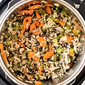 Rice and veggies added to an Instant Pot.