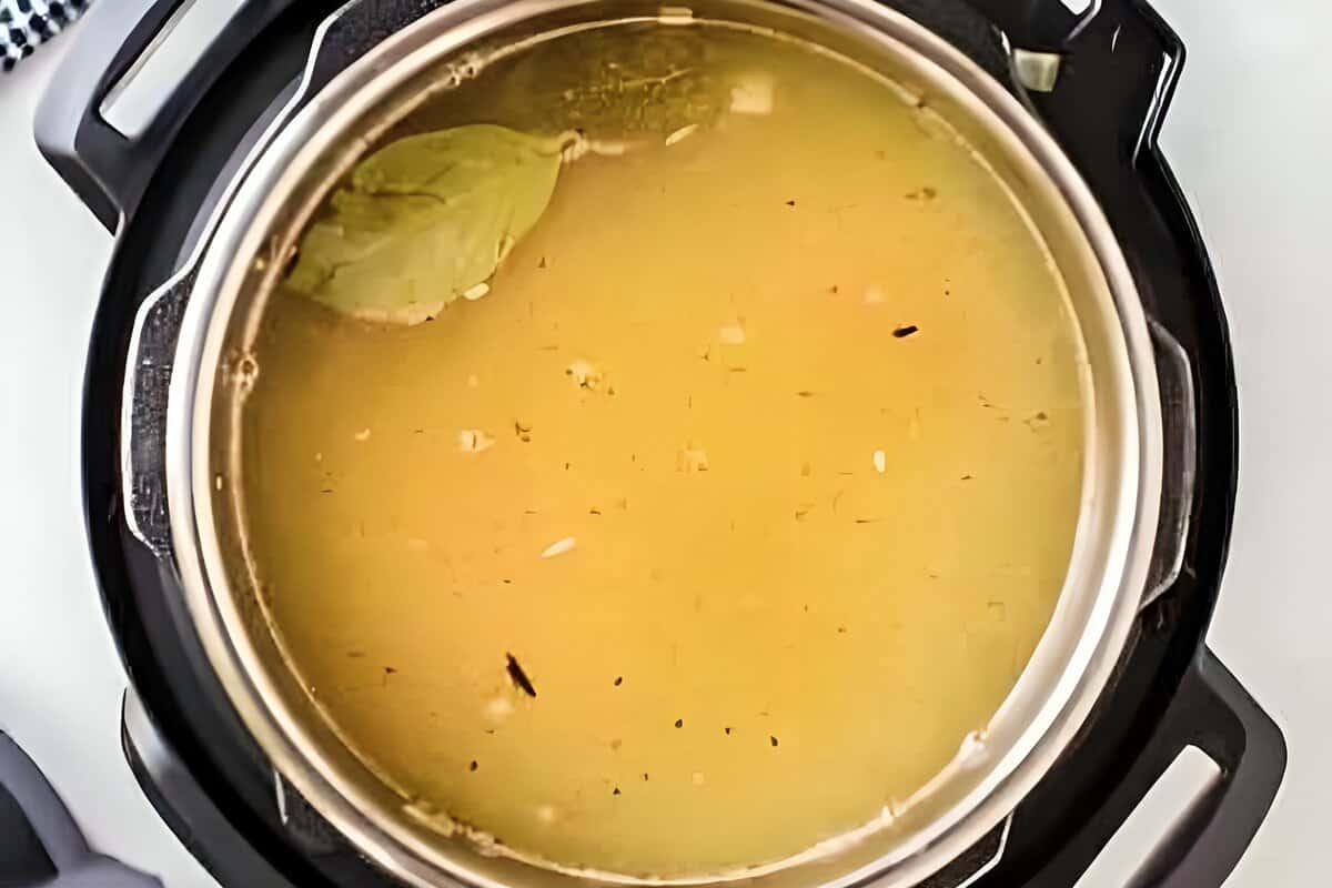 Broth added to an Instant Pot.