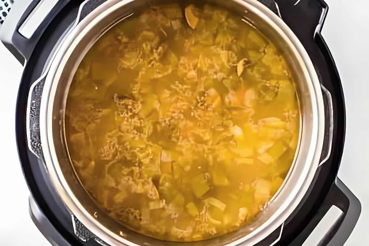 Soup ingredients added to an Instant Pot.