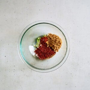 dry sauce ingredients in a glass bowl.