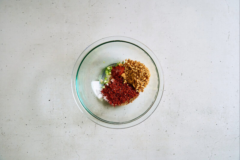 dry sauce ingredients in a glass bowl.