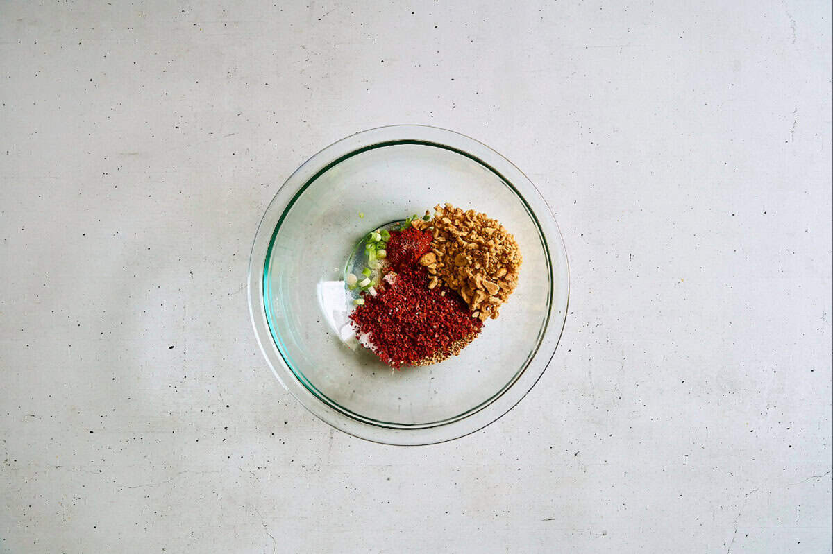 dry sauce ingredients in a glass bowl.