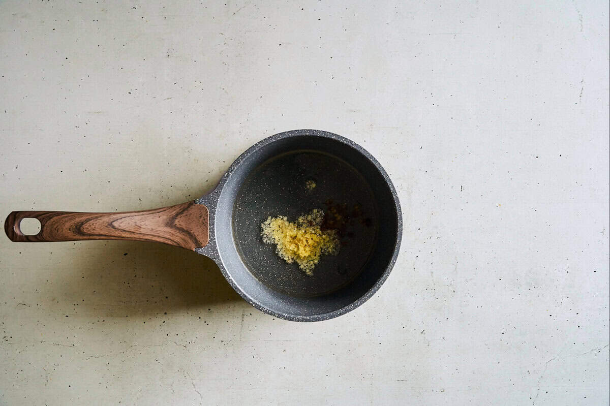 ginger and peppercorns in saucepan.
