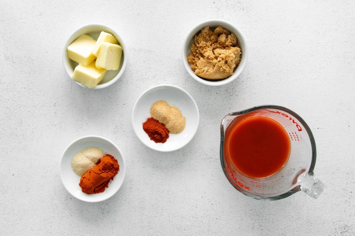 portioned ingredients for nashville hot sauce in individual containers.