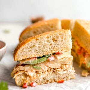 a slice of a chipotle chicken avocado melt.