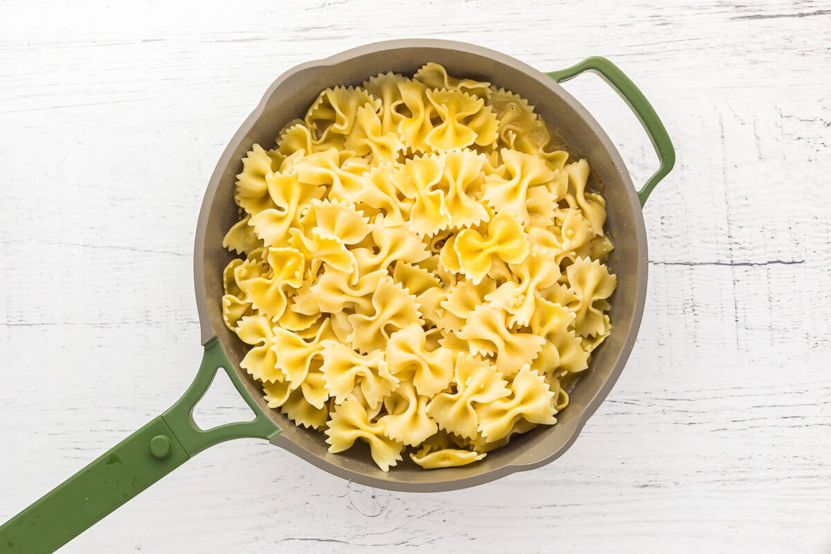 cooked pasta in a pan.