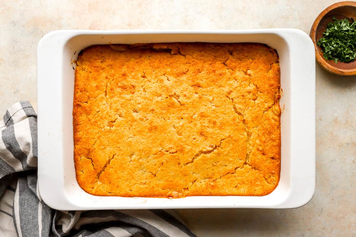 baked chicken cornbread casserole in a casserole dish.