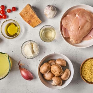ingredients for one pan ricotta chicken orzo skillet.