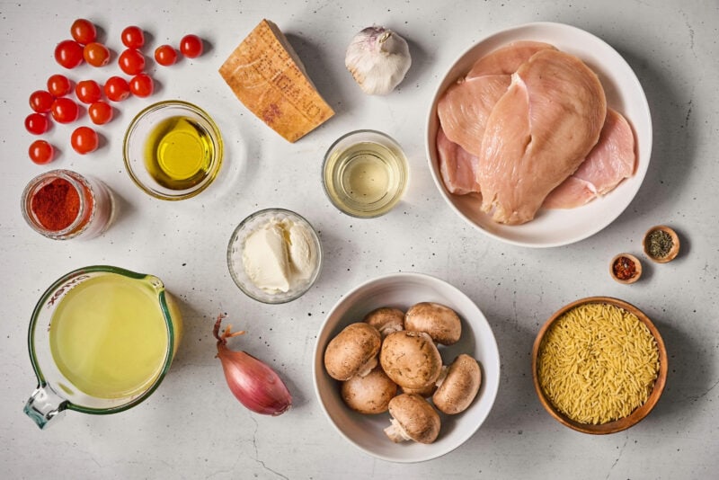ingredients for one pan ricotta chicken orzo skillet.