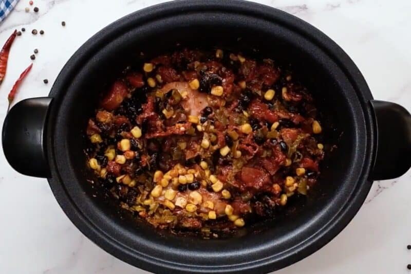 Mexican chicken taco ingredients in a Crockpot.