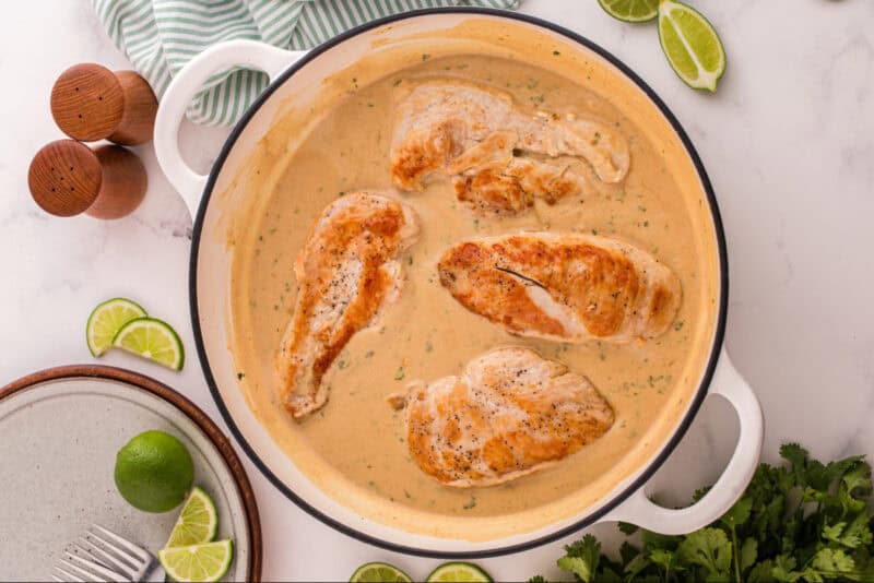 Chicken added back into the skillet with the sauce.