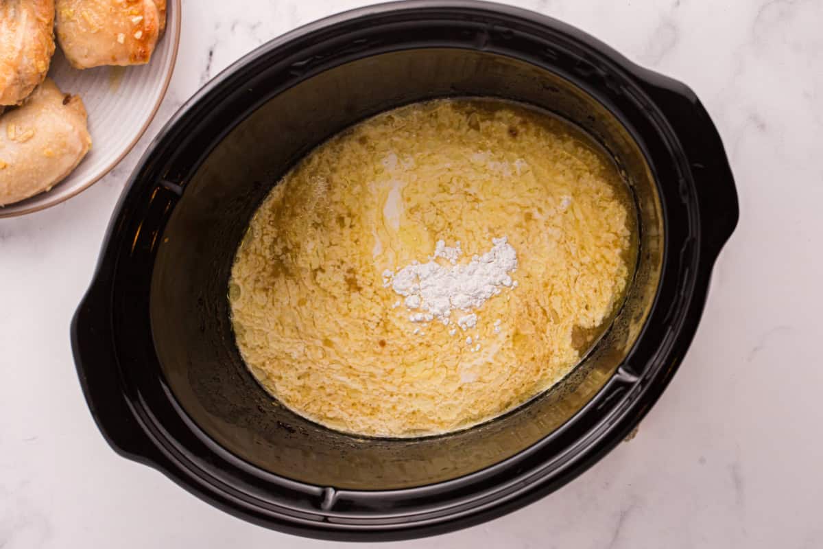 Thickened honey Dijon mustard sauce in a slow cooker.