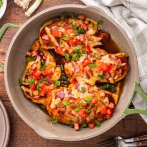 Monterey chicken with garnish.