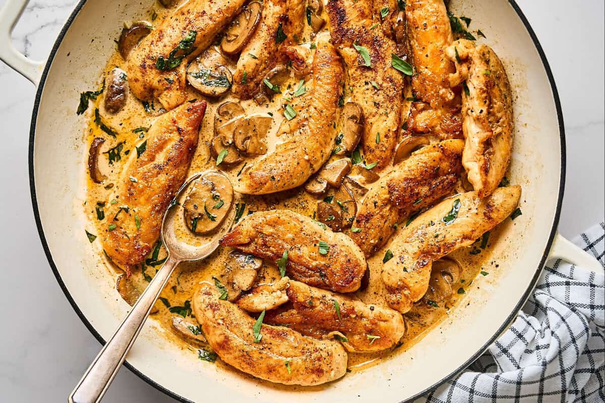 Chicken tenders and mushrooms in a creamy mustard sauce with fresh tarragon.