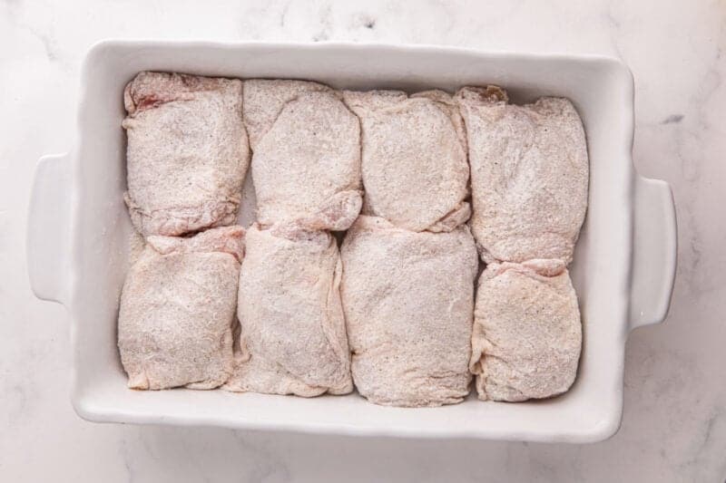 Coasted chicken in a baking dish.