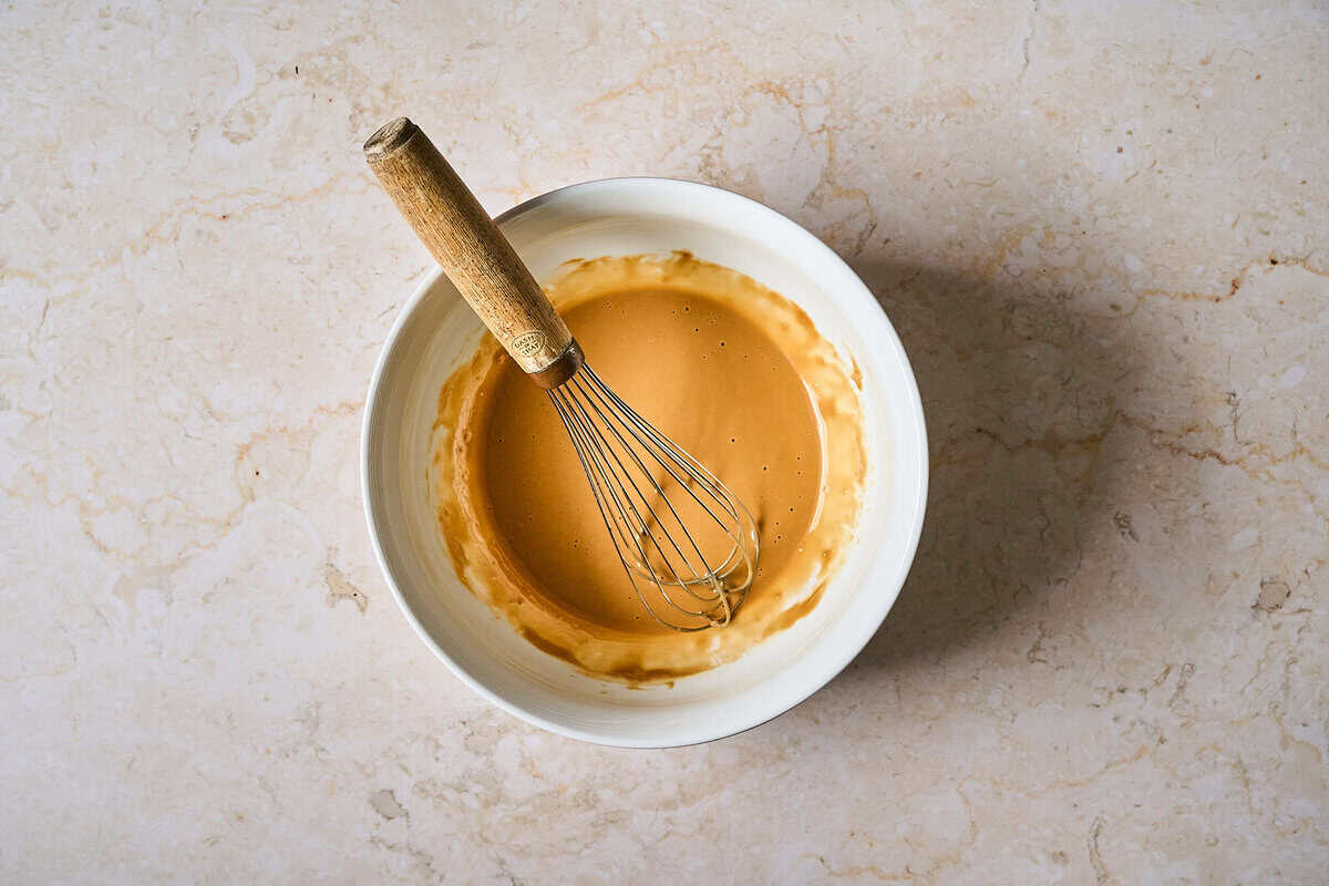 Tahini sesame dressing in a bowl.