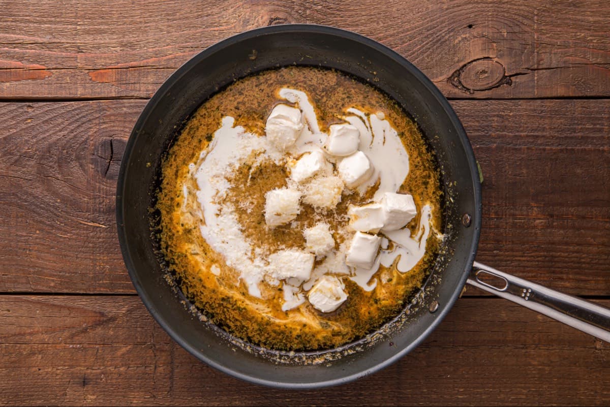 Cream cheese and heavy cream added to sauce.