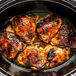 Sauce poured over the chicken thighs.