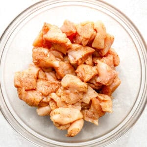 Chicken pieces tossed in seasoning.