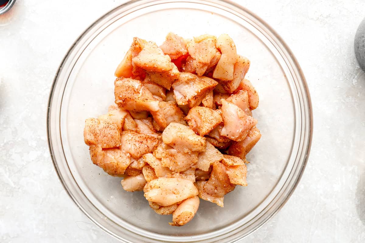 Chicken pieces tossed in seasoning.
