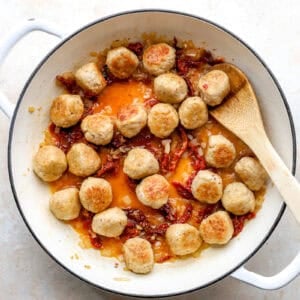 Meatballs added back to the skillet.