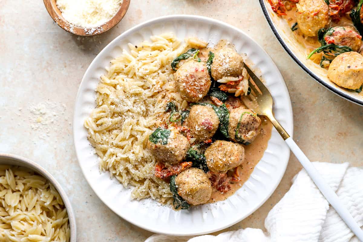 A serving of Marry Me chicken meatballs with orzo.