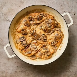 Chicken Diane in a skillet ready to eat.