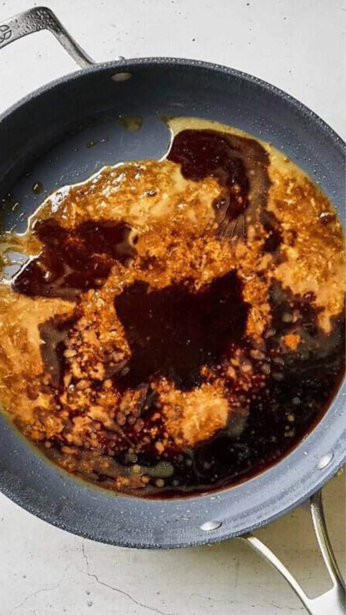 Separated shoyu sauce in a pan.