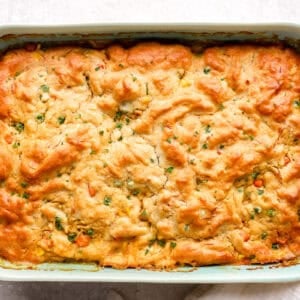 Chicken cobbler in a casserole dish ready to serve.