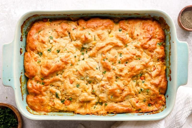Chicken cobbler in a casserole dish ready to serve.