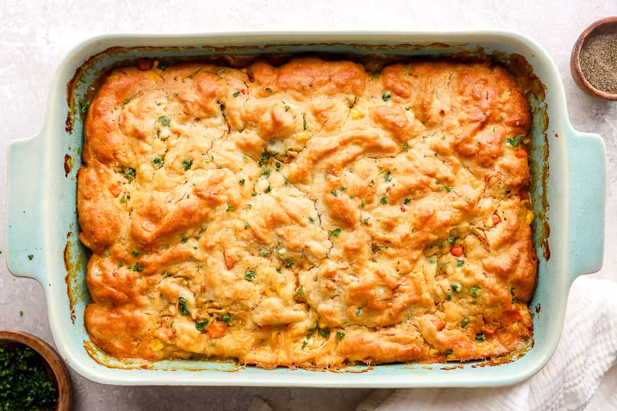 Chicken cobbler in a casserole dish ready to serve.