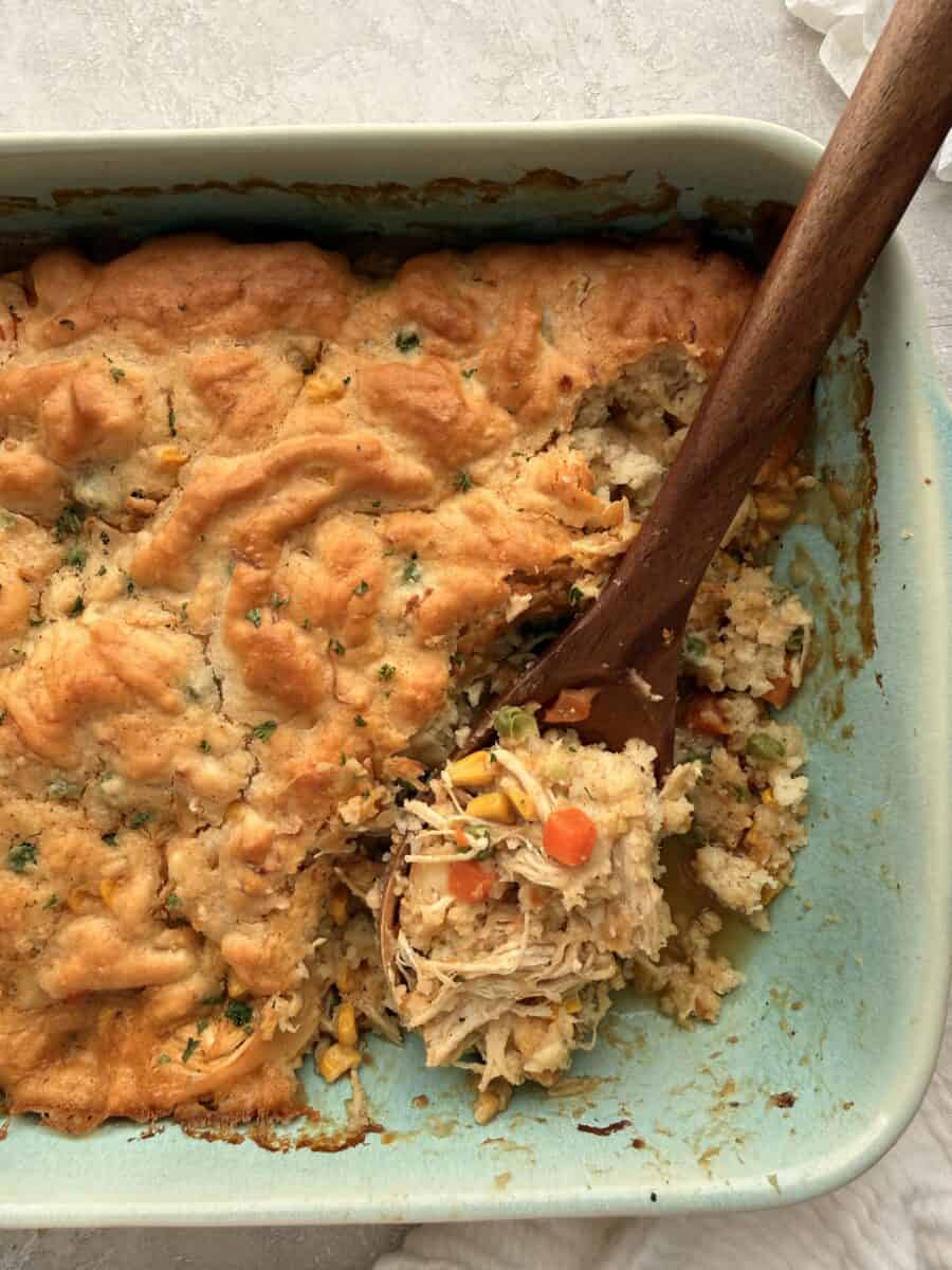 Biscuit-topped chicken cobbler in a casserole dish.