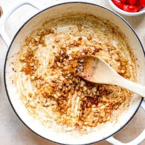 Sautéed garlic and onion in a pan.