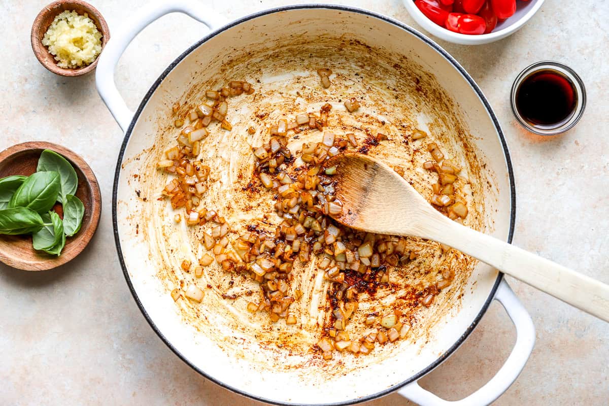 Sautéed garlic and onion in a pan.
