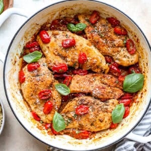 Tomato basil chicken in a pan.