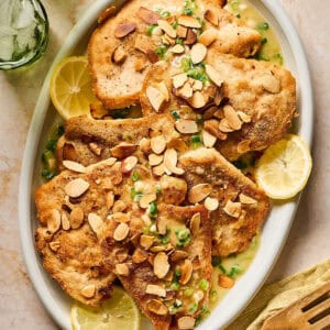 A serving platter of chicken almondine.