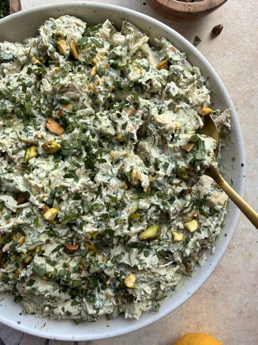 A bowl of green goddess chicken salad.