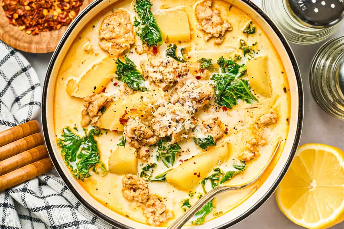 A serving of ground chicken Zuppa Toscana soup.