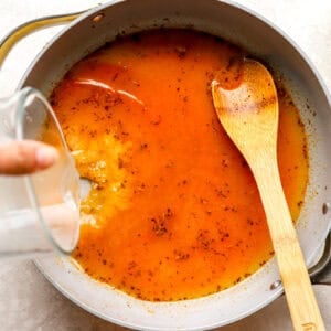 Cooking a sauce in a pan.