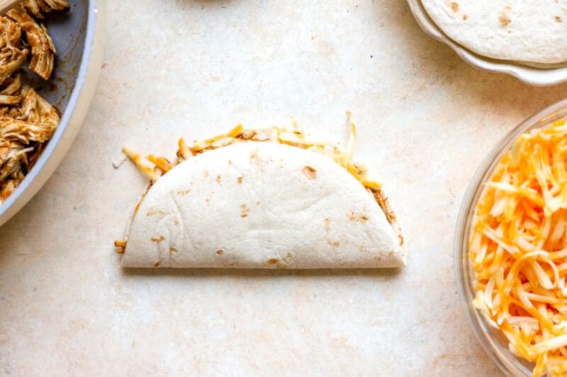 Folded flour chicken taco.