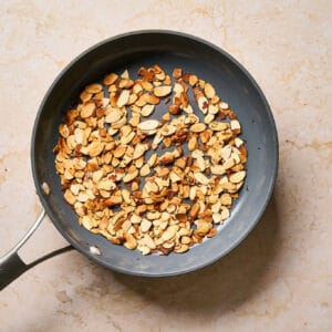 Toasted almonds in a pan.