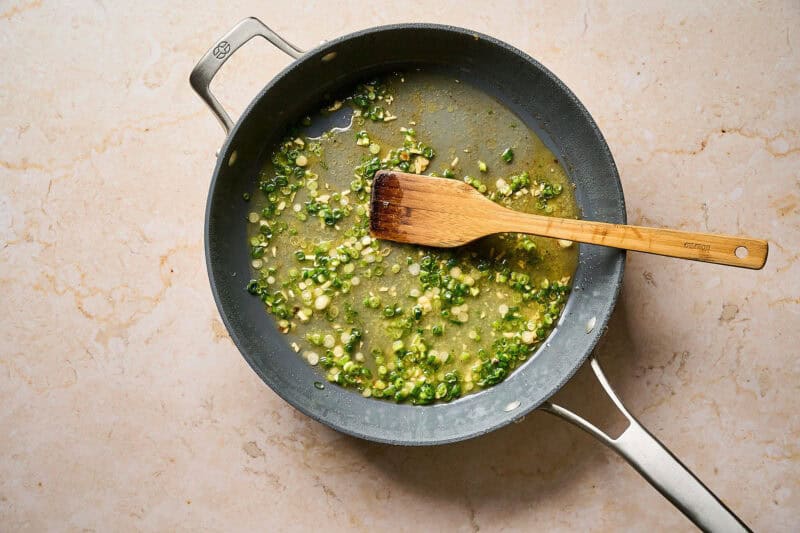 Deglazing a pan.