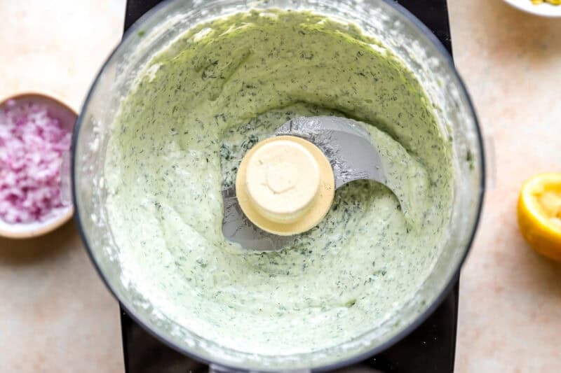 Green goddess dressing in a food processor.