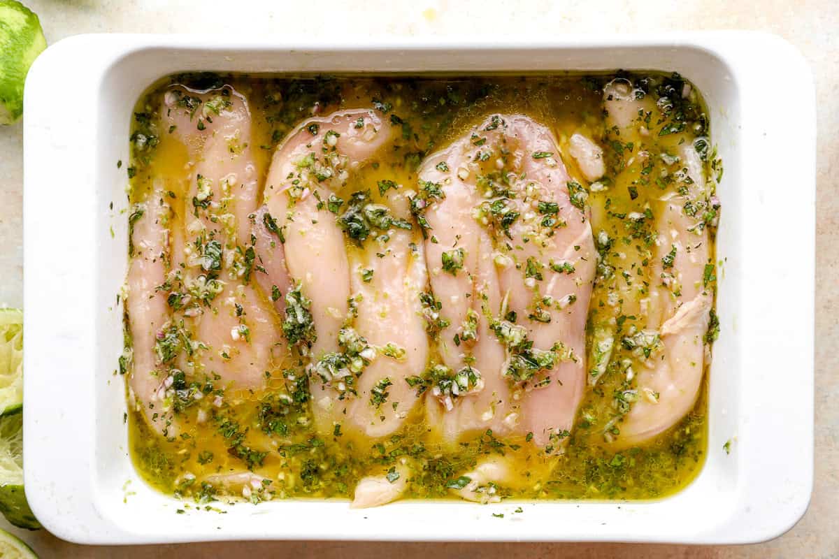 Chicken breasts marinating in mojito marinade.