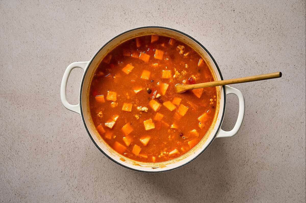 Sweet potato chili cooking in a pot.