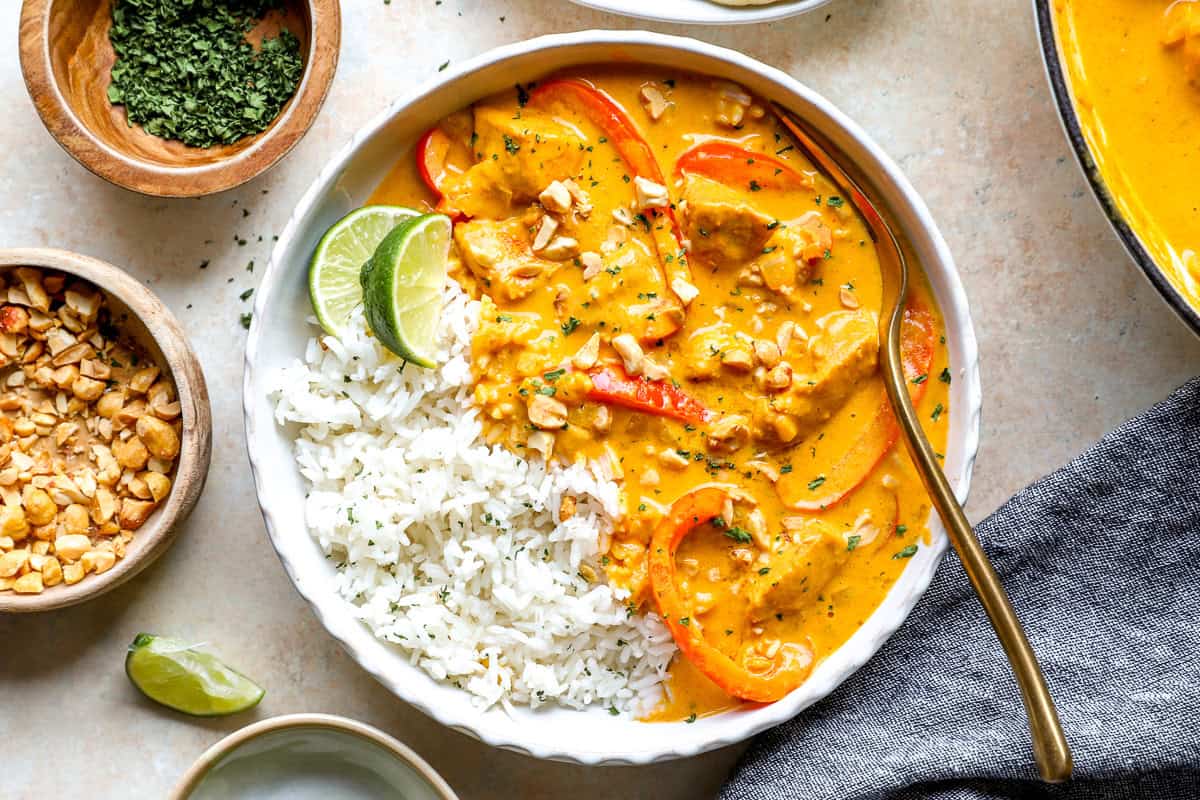 A serving of pumpkin chicken curry with rice.