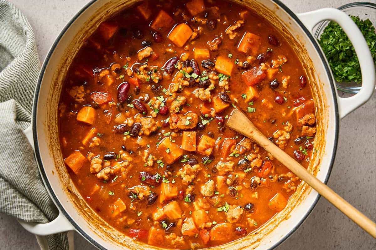 A pot of ground chicken sweet potato chili.
