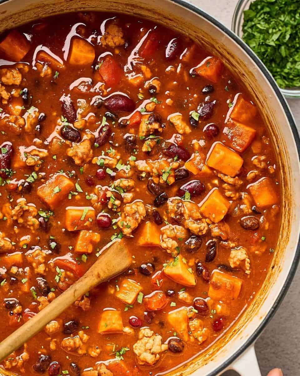 A pot of sweet potato chicken chili with beans.